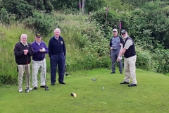 Pat teeing off